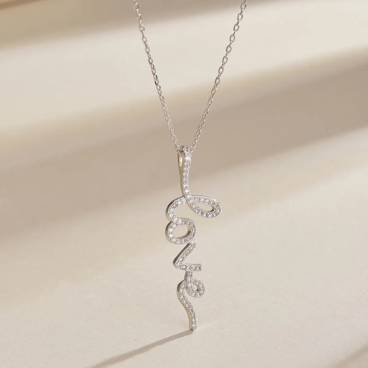 Pave CZ Cursive LOVE Vertical Pendant Necklace