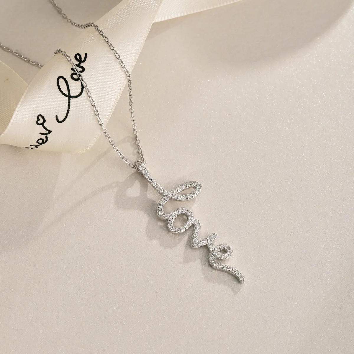 Pave CZ Cursive LOVE Vertical Pendant Necklace